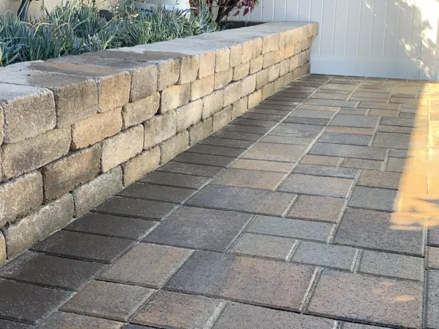 Stone seat wall and pavers built by 360 Remodeling & Building